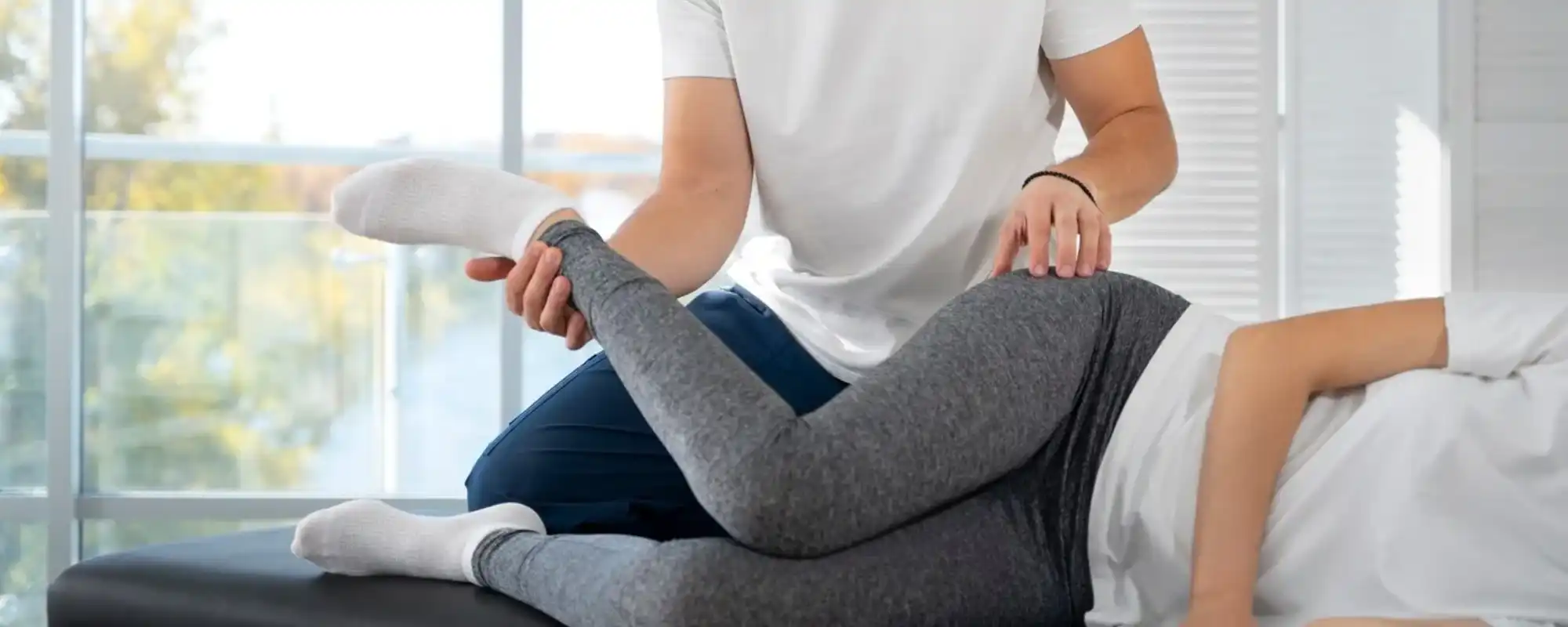 close-up-physiotherapist-helping-patient_23-2149173484 (1) (1)